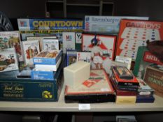 A selection of childrens toys games and puzzles including Trivial Persuit