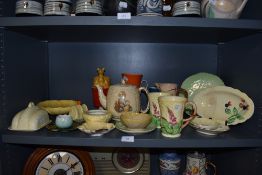 An assortment of vintage ceramics including Carlton ware,Sylvac and Wade.