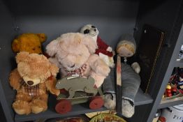 A selection of child toy teddy bears and similar including wooden hare toy and a Chinese fan