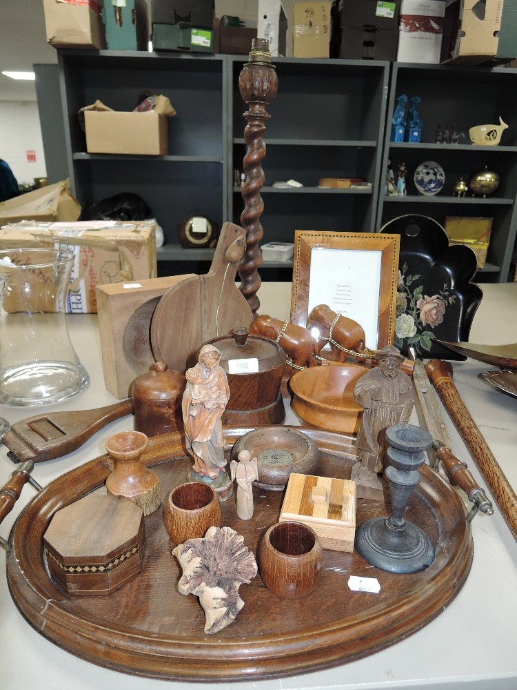 A selection of treen wood carved items including serving tray and tobacco jar