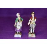 Two early 19th century figurines, one depicting maiden with flower basket, the other a young gent in