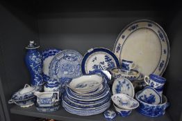 A large collection of blue and white ware including Woods ware, Meakin, Booths and more.