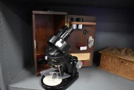 A vintage W.Watson and sons ltd London microscope in box.