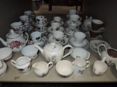 A selection of tea cups saucers and tea pots including Midwinter and Figgjo Flint