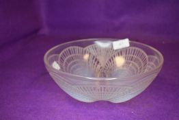 An art deco Rene Lalique opalescent coquille bowl having overlapping shells.