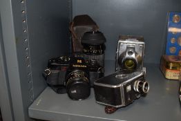 A selection of cameras and photographic items including C8 Paillard Bolex, RF Hunter Gilbert,