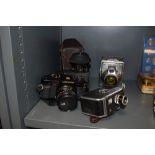 A selection of cameras and photographic items including C8 Paillard Bolex, RF Hunter Gilbert,