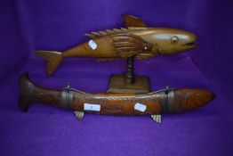 A vintage fish serving knife and fork in carved fish formed holder also included is a Pitcairn islan