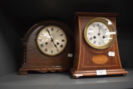 Two early 2oth century mantel clocks, one having inlaid shell detailing to case, the other being