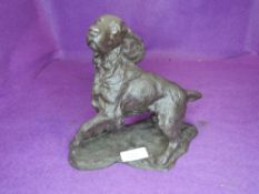 A figure of a Spaniel dog by Heredities