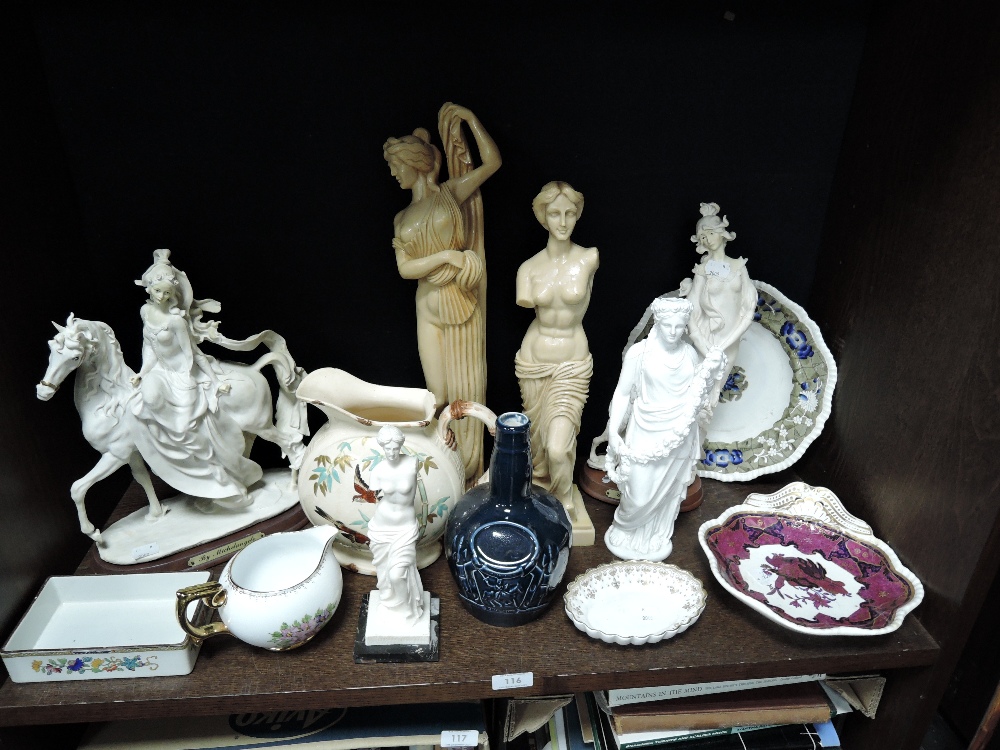 A mixed lot of ceramics and figurines including Copeland jug, Spode plate and bottle and more.