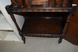 A priory style dark stained tea trolley