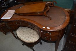 An early 20th Century mahogany and inlaid kidney shaped dressing table , stool and mirror (mirror in