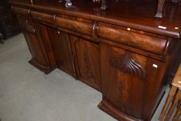 A 19th Century mahogany occasional table having bleached oval top on William IV style base, diameter
