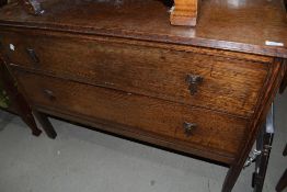 An early 20th Century oak bedroom chest of two drawers