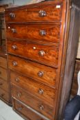A 19th Century mahogany wardrobe centre section comprising seven long drawers