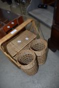 A wicker two bottle wine basket