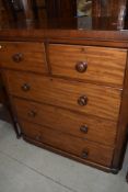A Victorian mahogany of two short over three long drawers, frame a bit loose
