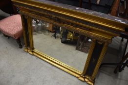A reproduction Adams style gilt effect mirror