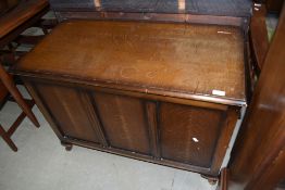 A mid to late 20th Century oak and ply bedding box