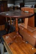 A 19th Century mahogany occasional table having dish top, on burr elm triple splay base