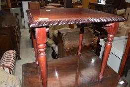 A reproduction mahogany occasional table (ex nest)