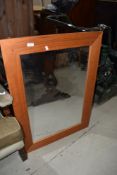 A modern pine wall mirror, approx. 92 x 67cm