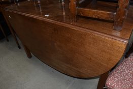A Victorian mahogany gateleg dining table