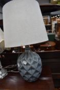 A modern ceramic table lamp