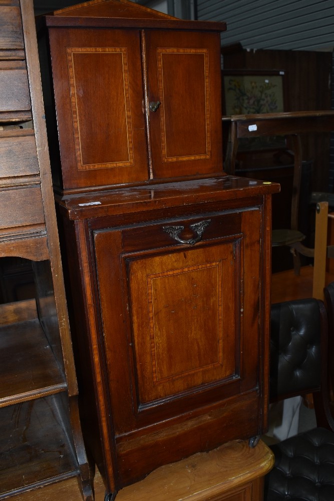 An Edwardian mahogany and inlaid coal purdonium/smokers cabinet