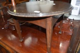 An early 20th century dark stained circular occasional table, diameter approx. 61cm
