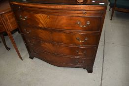 An early 20th Century reproduction bow fronted chest of drawers, width approx. 92cm