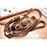 Three leather rifle slings