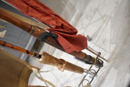 A vintage split cane fly fishing rod
