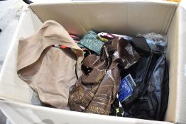 A box of gun and shooting related items including bags and gloves etc.