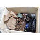 A box of gun and shooting related items including bags and gloves etc.