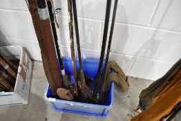 A selection of vintage fishing rods.
