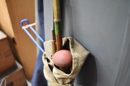 A vintage split cane rod with sleeve