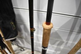 Two carbon fibre fly rods with sleeves