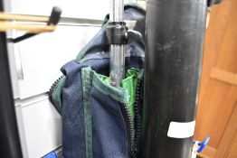 A large rod bag containing heavy duty umbrella and two empty rod tubes