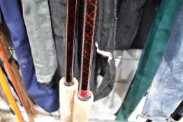 Two large carbon fibre salmon rods with sleeves