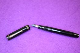 A Parker Duofold button fill fountain pen in black with two bands to cap, having a Parker Duofold