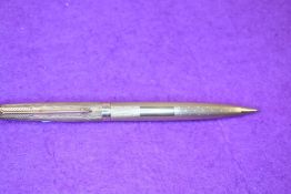 A Parker 61 propelling pencil in gold stamped 9 .375