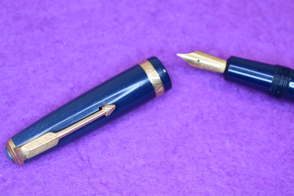 A Parker Duofold fountain pen in blue, (made in England) with a decorated broad band to the cap. - Image 2 of 2