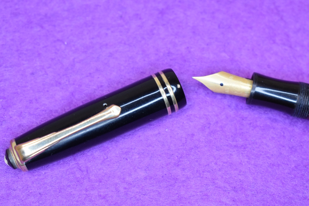 A Montblanc 245 EF piston fill fountain pen in black with gold trim, having a Montblanc 6 nib. - Image 2 of 2