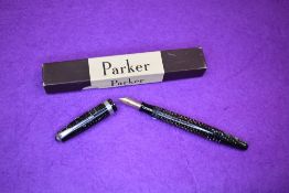 A Parker Vacumatic Long Major fountain pen with decorative band to cap and blue diamond to clip