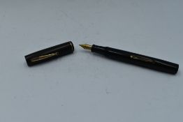 A Watermans Ideal leverfill fountain pen in black with single narrow band to cap and a Watermans