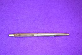 A Parker rolled gold ballpoint pen