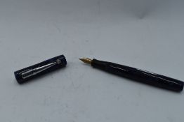 A Mabie Todd & Co Blackbird Self filler Leverfill fountain pen, in blue marble, with two narrow
