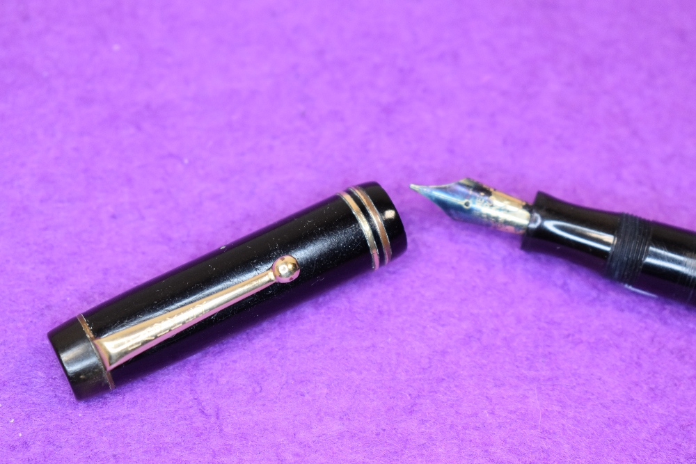 A Parker Duofold button fill fountain pen in black with two bands to cap, having a Parker Duofold - Image 2 of 2
